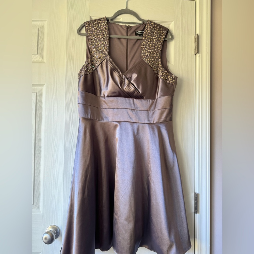 Evening dress size 14, silky. Fully lined, knee length.